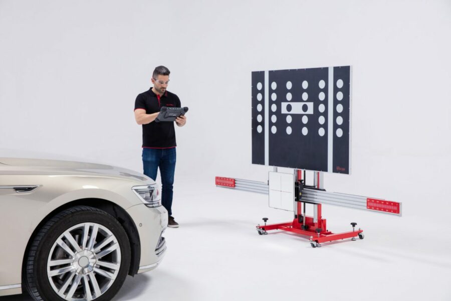 Autel employee working with ADAS Calibration System